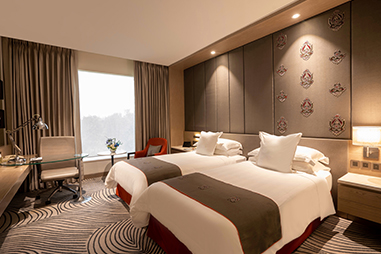 deluxe-room-twin-bed.jpg