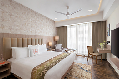 deluxe-room-bedroom.jpg