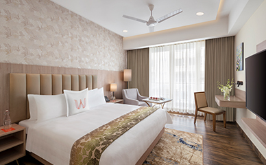 deluxe-room-bedroom.jpg